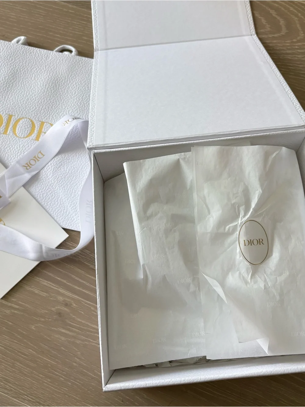 Dior gift box and bag with logo ribbon